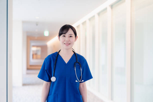 istock Doctor walking through a beautiful hospital. 2156707436