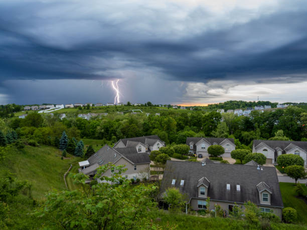 Dramatic lightning strike over American neighborhood in the evening