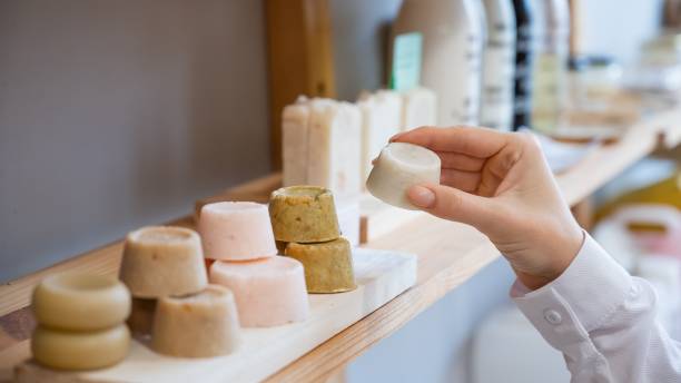 istock Woman chooses organic soap in eco friendly store. 2156708571