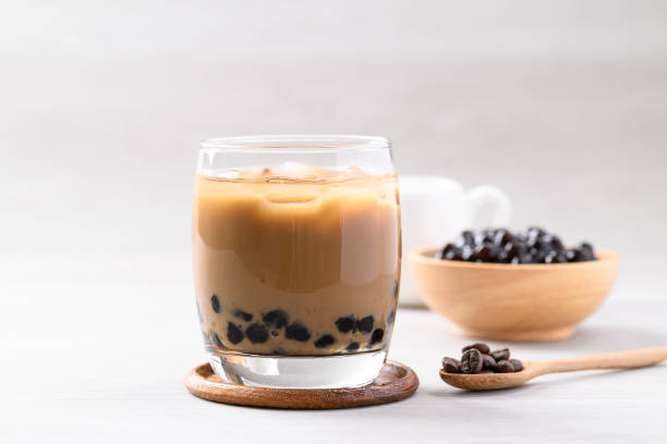 istock Iced coffee latte milk bubble tea in glass with white background 2156710519