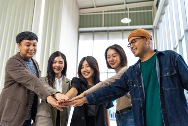 istock Happy diverse group Asian business start up freelance team analyzing statistics financial. Group Team of business people meeting conference discussion various topic corporate concept in office. 2156715259