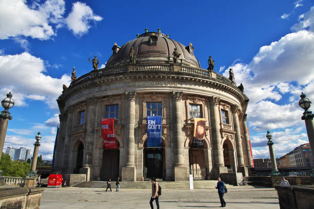 Berlin, Germany, March 6, 2024: view along the river Spree towards the Bode museum at museum island, with the Fernsehturm (television tower) in the background