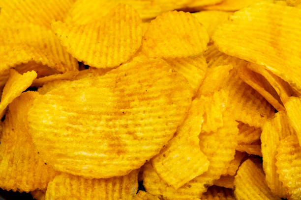 istock Potato chips close-up, fast food 2156726737