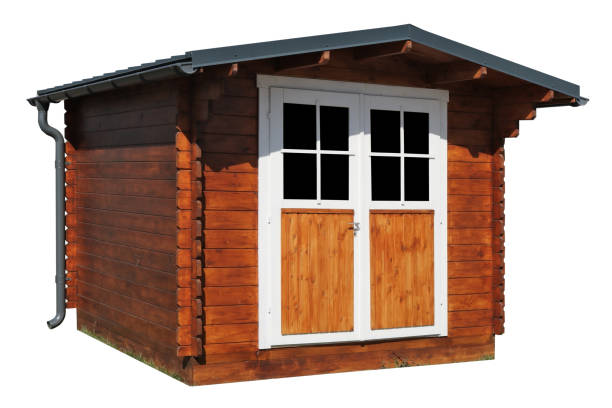 istock Small homemade rustic barn made of pine boards isolated 2156726989
