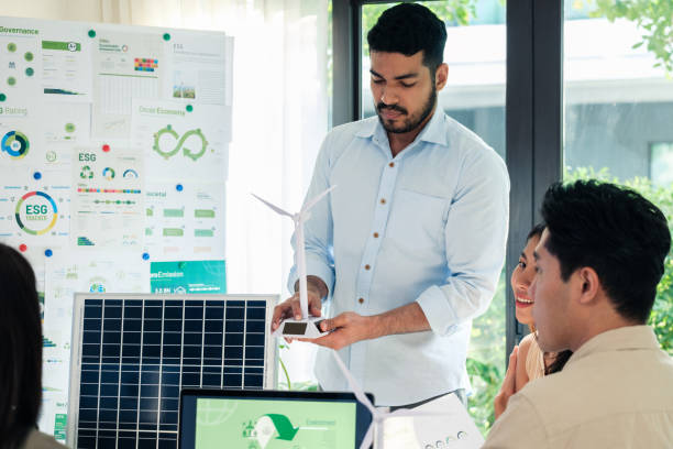 istock Diversity team presentation new design solar cell panel renewable energy innovation at office 2156727768