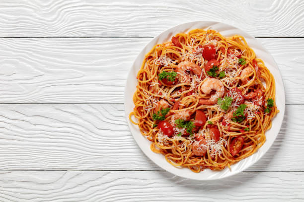 istock shrimp fra diavolo with spaghetti on a plate 2156728635