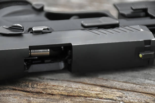 istock 9mm pistol gun and ammunitions 2156729280