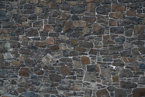 istock old brown stone wall texture and background, close up 2156735908