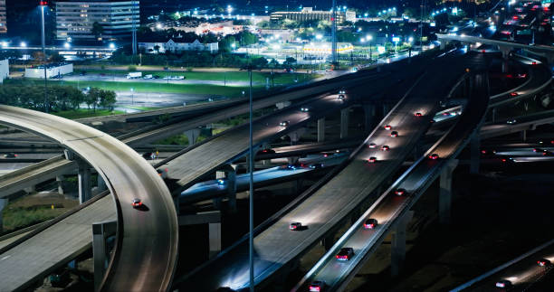 istock Drone Shot of West Loop on a Houston Highway at Night 2156739130