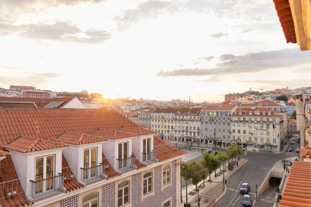 istock Sunset Over Historic City with Red-Tiled Rooftops 2156739180