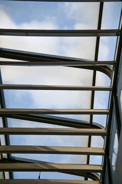 istock Abstract ceiling in office building, interior design. Details of modern architecture. 2156739471