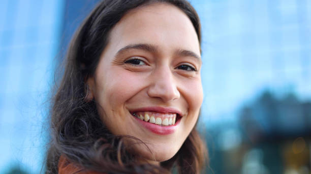 istock Happy young woman smiling and enjoying 2156741687