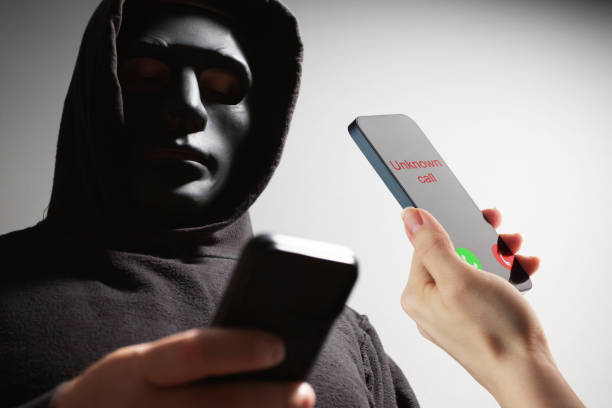 istock Phone Scam, incoming unknown call on a smartphone screen, phishing threat to personal information, mobile phone cyber attack, identity theft risk. 2156742724