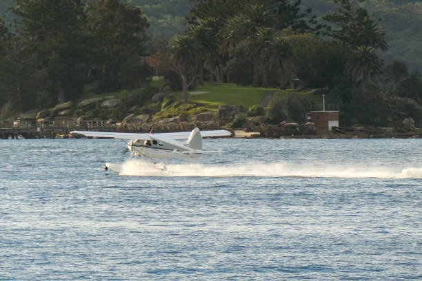 A seaplane throttles down for the evening.  Long exposure in twilight.