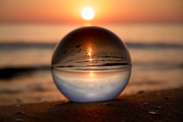 istock Crystal ball at sea during dawn 2156744524