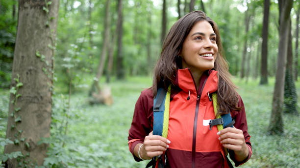 istock Beautiful girl enjoying hiking 2156746136