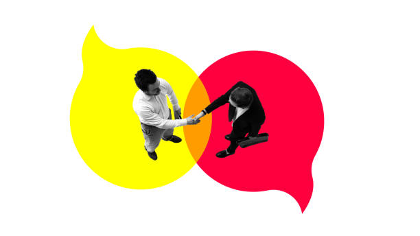 istock Two men, business people shaking hands against colorful speech bubbles. Communication and partnership. Contemporary art collage. 2156746149