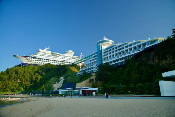 Gangneung, South Korea - May 18th, 2024: The Sun Cruise Resort, designed to resemble a cruise ship, stands on a hilltop overlooking Jeongdongjin Beach, offering stunning views of the East Sea and surrounding landscape.