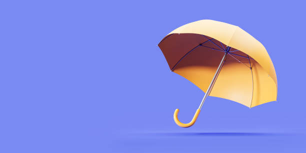 istock Yellow umbrella on empty purple background, protection concept 2156749630