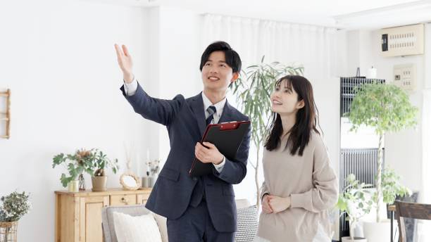 istock Asian businessman showing the room 2156750773