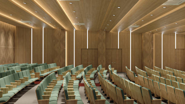 A wood panelled and minimal color scheme in the modern auditorium interior