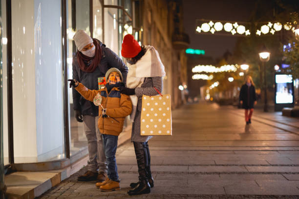 istock Family Christmas Shopping at Night 2156752346