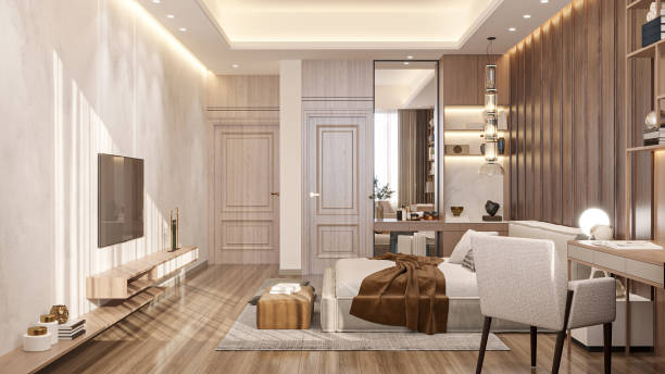 istock A serene and neutral-toned bedroom with a low-profile bed and a wall-mounted TV console and study desk 2156752661