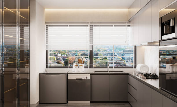 istock kitchen interior with sleek countertops, stainless steel appliances, and natural light 2156753401