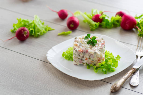 istock vegetable salad with boiled vegetables and dressed with mayonnaise 2156756831