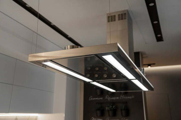 istock Modern metal kitchen hood on a white kitchen 2156756908