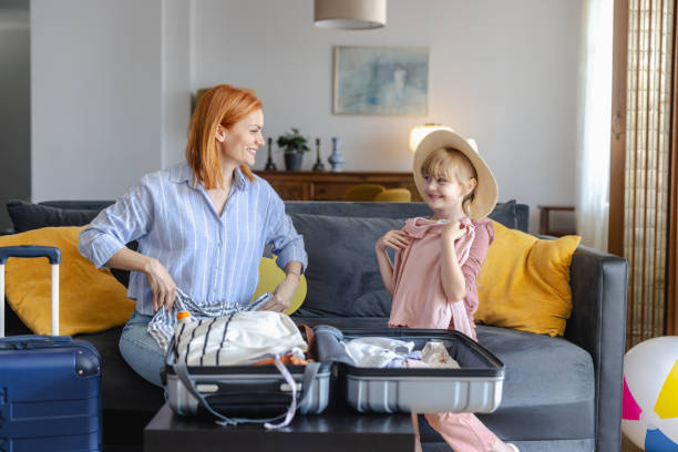 istock Getting ready for a summer holiday with child 2156758946