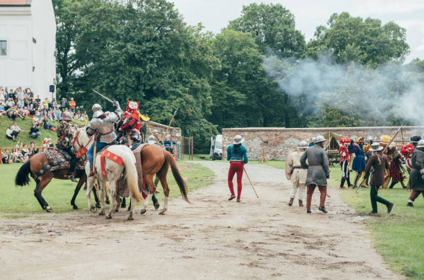 Červený Kameň Castle, Slovakia - May 25, 2024: People in medieval attires historical reenactment event. Reconstructions provide valuable insights into daily life, past eras traditions in Slovakia.