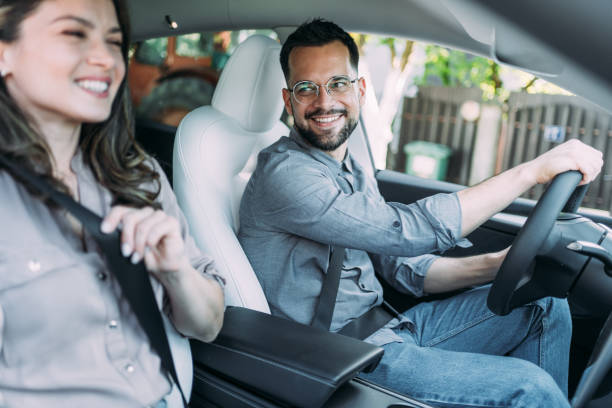 istock Young couple traveling by car. 2156762046