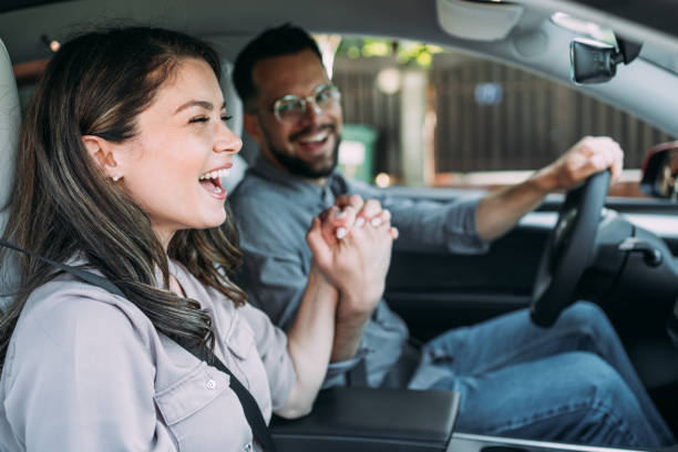 istock Young couple traveling by car. 2156762047