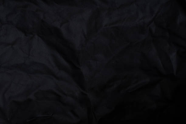 istock Black crumpled paper with shadow for background. wrinkled surface, design, wallpape 2156762209