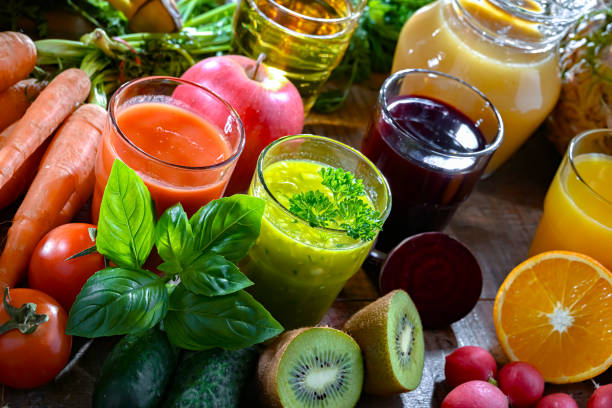 istock Glasses with fresh organic vegetable and fruit juices 2156768041