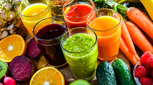 istock Glasses with fresh organic vegetable and fruit juices 2156768070