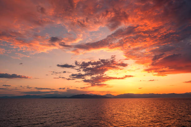 istock Sunrise over coast of Corsica 2156769003