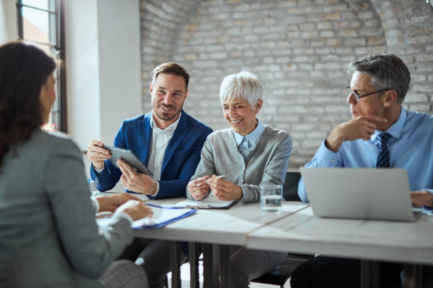 istock Human resource team using digital tablet on a job interview in the office. 2156773157