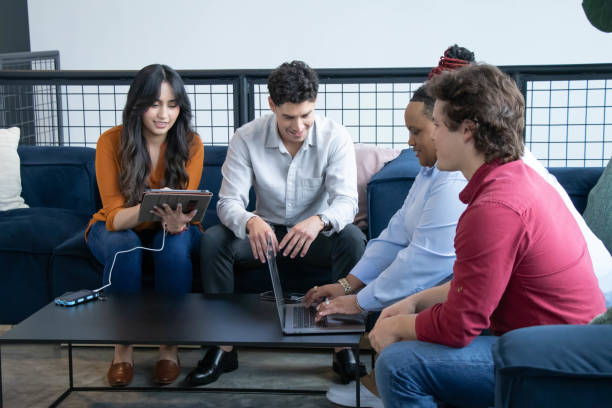 istock Small Group Meeting With Laptop And Portable Solar Panel 1 2156773972