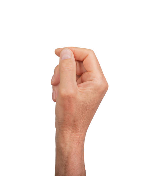 istock Hand holding something small, isolated on white background. Gesture indicating a pinch or grasp, 2156774193
