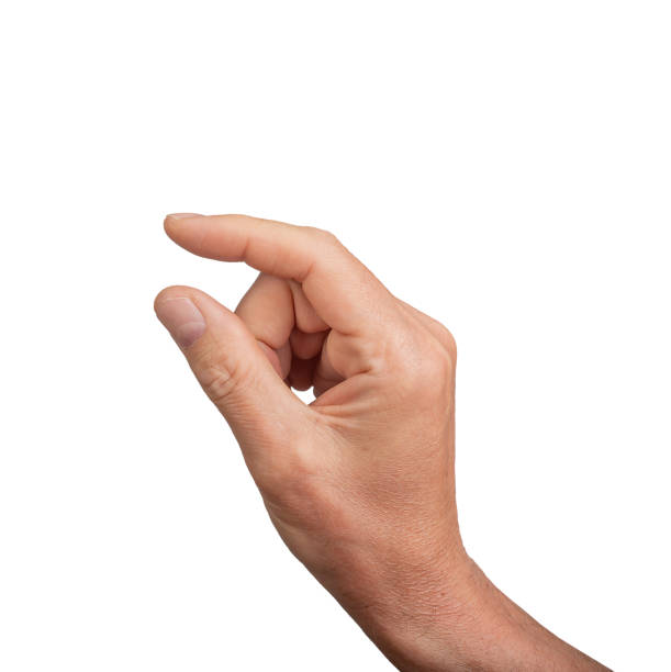 istock Hand holding a little bit of something, isolated on white background. Gesture indicating a pinch or 2156774225