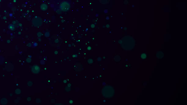 istock Abstract dust particles with green light on dark background. Science backdrop with moving glittering dots. Flying particles with effect bokeh. 3d rendering. 2156776169