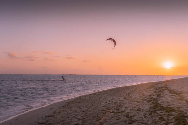 Lonely kitesurfer during the sunset