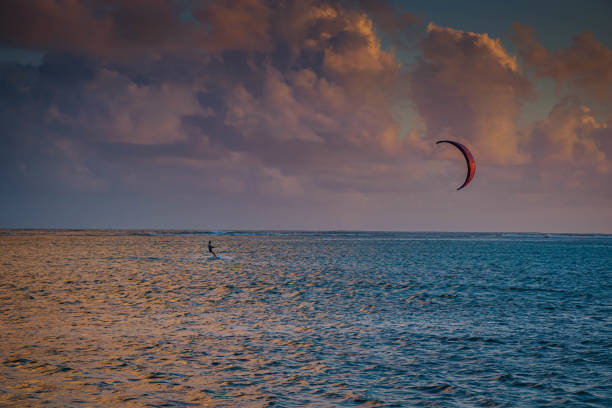 istock Kite surfing during the colorful sunset 2156779951