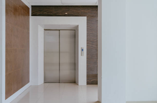 istock Elevator in the lobby hall of a house. 2156780685
