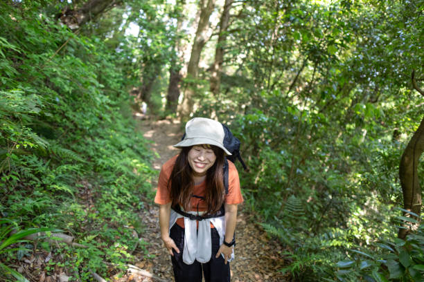 istock Female hiker walking up mountain 2156781551