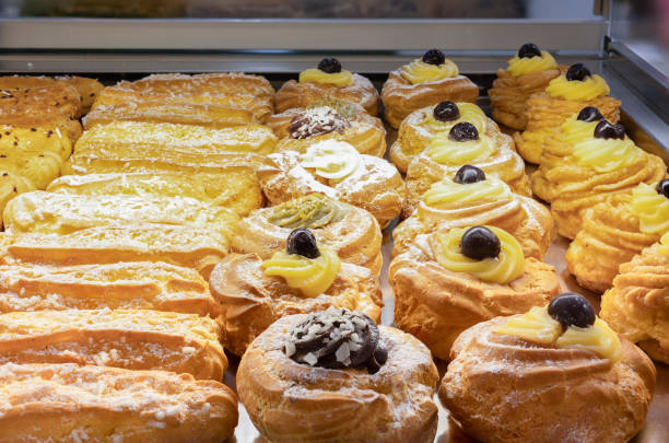 istock Assorted Pastries with Chocolate, Cream and Fruit on Exhibition inside a Pastry Shop 2156782000