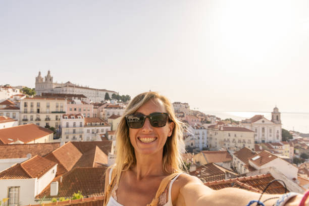 istock Woman Taking Selfie with Scenic City View 2156783319