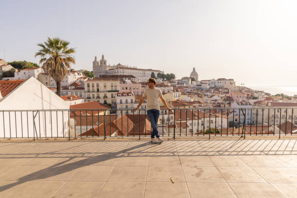 istock Man Posing with Scenic City View 2156783344